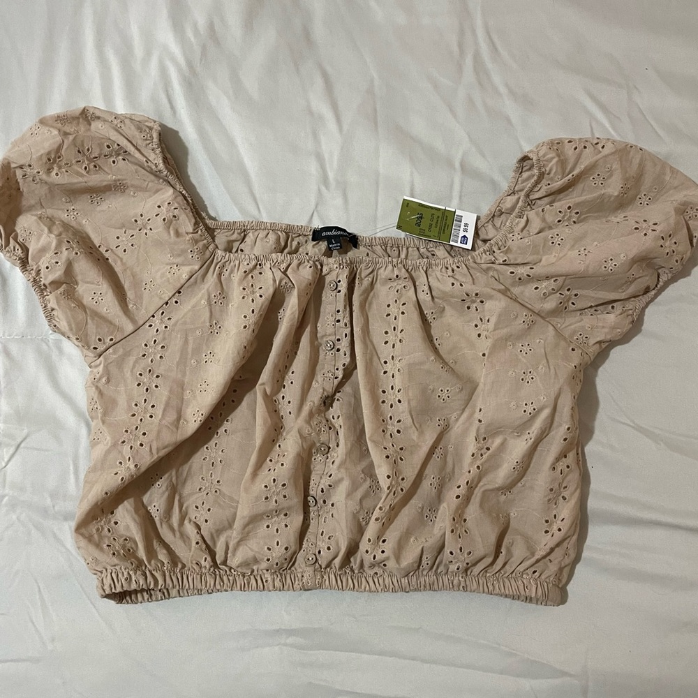 Nude/Tan crop top.